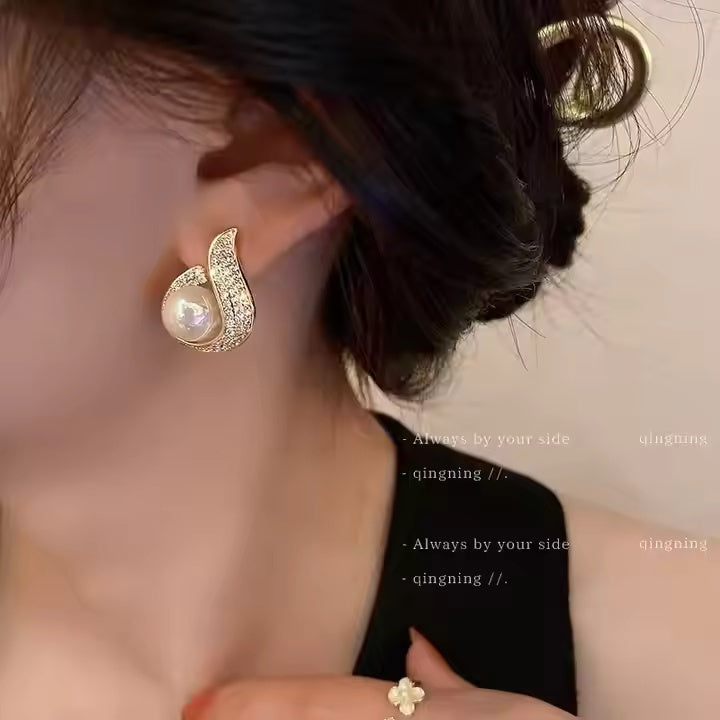 Curve Pearl Golden Finish Earrings