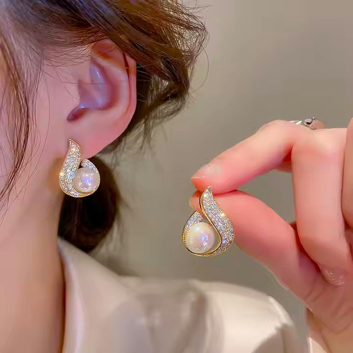 Curve Pearl Golden Finish Earrings